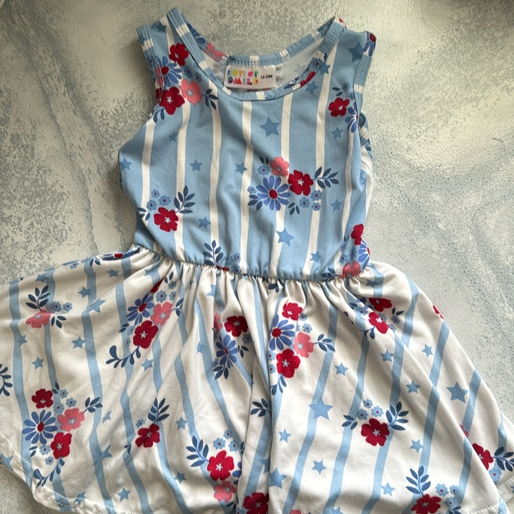 Dot Dot Smile tank top dress. Size 12-24 months. Floral/star pattern.
